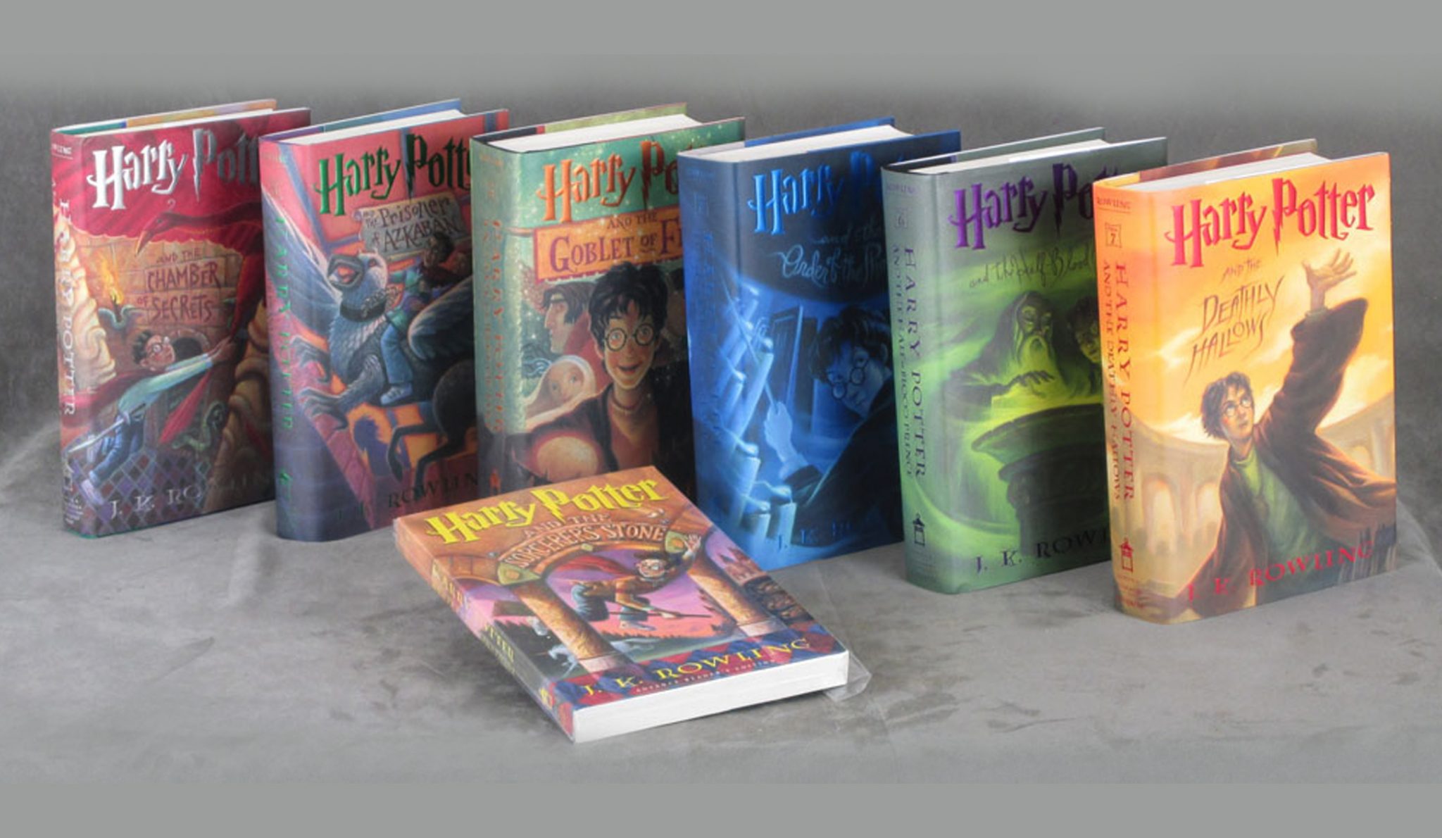 J k rowling s harry potter. Роулинг Гарри Поттер книги. Джоан Роулинг Гарри Поттер. Книга Гарри Поттер Дж Роулинг. Джоан Роулинг Гарри Поттер книга обложка.